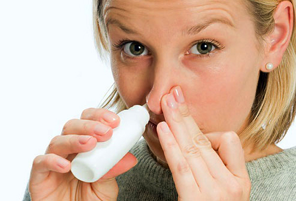 Using a nasal spray