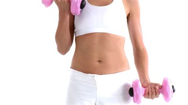 stock-footage-sporty-hispanic-woman-working-out-with-dumbbells-against-a-white-background