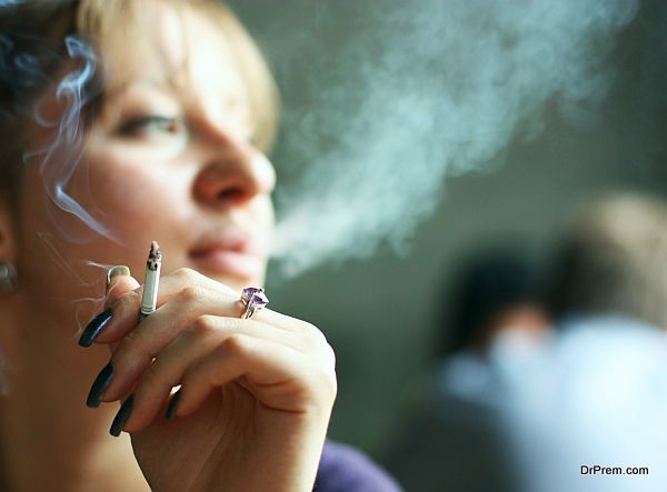 young woman smoking cigarette