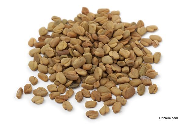 Heap of Fenugreek seeds on white background