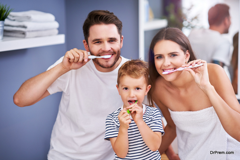 family members brushing teeth