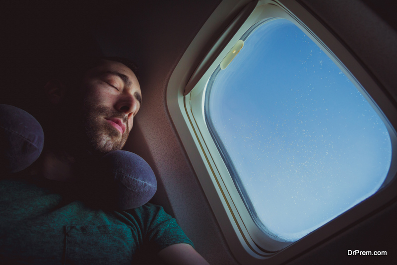 man Sleeping on the Plane